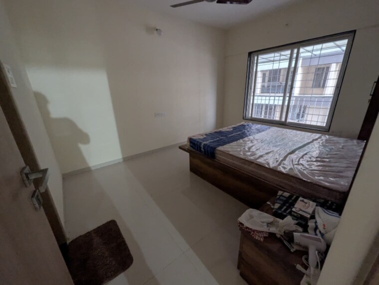 Bedroom, sukhwani-artize 2 Bedroom 1000 Sq.Ft. Apartment In Ravet Pune 9650023