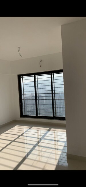 Room in 2 BHK Apartment at Acme Oasis, Kandivali East – for Rent