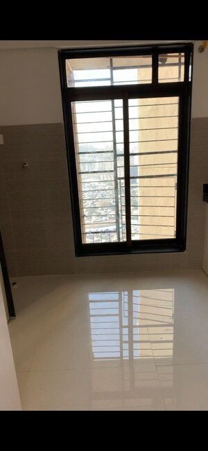 Room in 2 BHK Apartment at Acme Oasis, Kandivali East – for Rent
