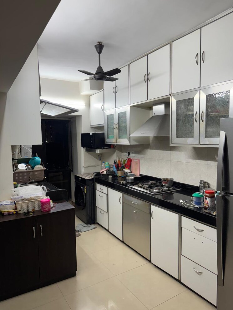 Kitchen, lokhandwala-whispering-palms 2 Bedroom 930 Sq.Ft. Apartment In Kandivali East Mumbai 9650093