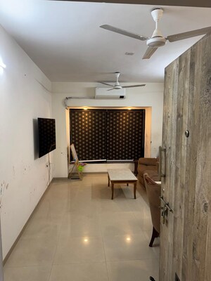 Living Room in 2 BHK Apartment at Lokhandwala Whispering Palms, Kandivali East – for Rent