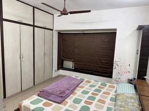 Bedroom in 2 BHK Apartment at Lokhandwala Whispering Palms, Kandivali East – for Rent