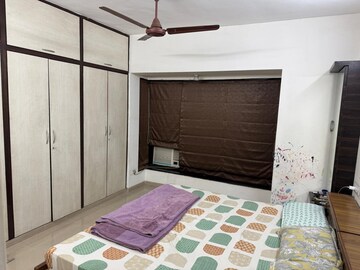 Bedroom in 2 BHK Apartment at Lokhandwala Whispering Palms, Kandivali East – for Rent