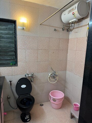 Bathroom in 2 BHK Apartment at Lokhandwala Whispering Palms, Kandivali East – for Rent