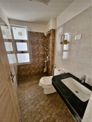 Bathroom in 3 BHK Apartment at KLJ Greens, Sector 77 – for Sale