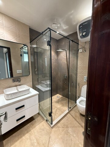 Bathroom in 4 BHK Builder Floor at Ansal Sushant Apartments, Sushant Lok I – for Rent