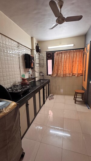 Kitchen in 1 BHK Apartment at Kshitij CHS, Goregaon East – for Rent