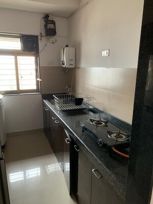 Kitchen in 2 BHK Apartment at Acme Ozone Phase II, Ghodbunder Road – for Rent