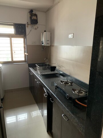 Kitchen in 2 BHK Apartment at Acme Ozone Phase II, Ghodbunder Road – for Rent