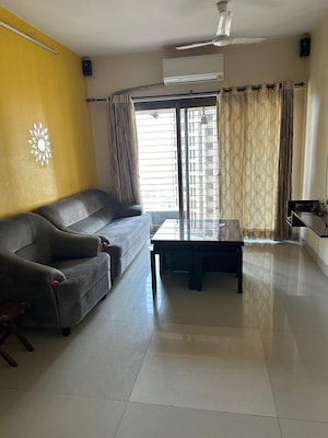 Living Room in 2 BHK Apartment at Acme Ozone, Manpada – for Rent