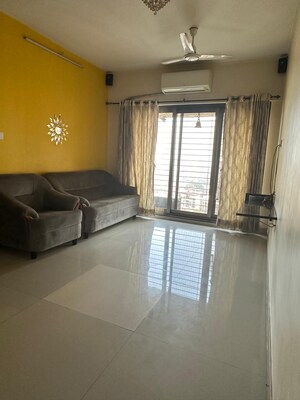 Living Room in 2 BHK Apartment at Acme Ozone, Manpada – for Rent