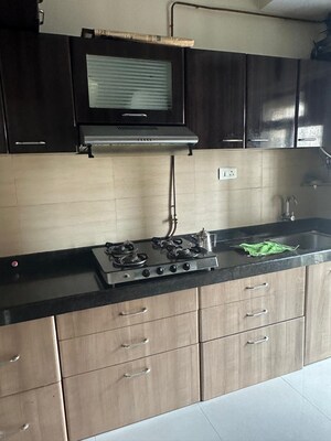 Kitchen in 2 BHK Apartment at Acme Ozone, Manpada – for Rent