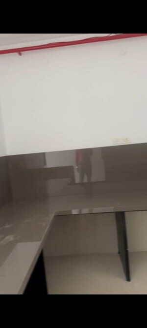 Kitchen in 4 BHK Apartment at Model Colony – for Sale