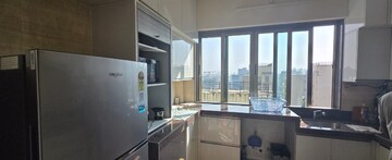 Kitchen in 3 BHK Apartment at KM Mid Summer CHS, Santacruz West – for Rent