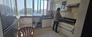Kitchen in 3 BHK Apartment at KM Mid Summer CHS, Santacruz West – for Rent