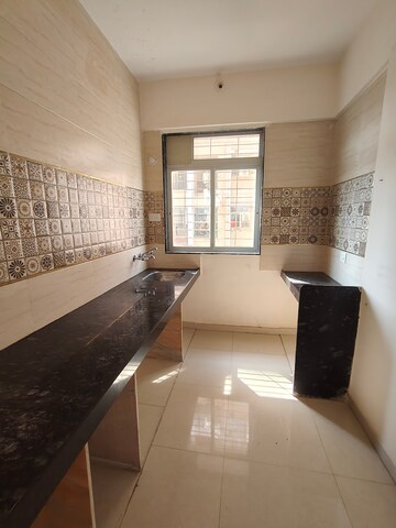Kitchen in 1 BHK Apartment at Patel Ram Ambar, Ambernath East – for Rent