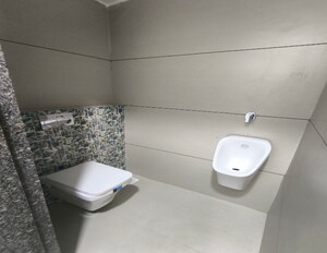 Bathroom in 4 BHK Apartment at Adajan – for Sale