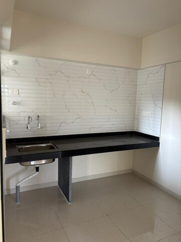 Kitchen in 2 BHK Apartment at Kolte Patil Life Republic, Hinjewadi – for Rent