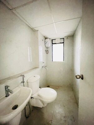 Bathroom in 1 BHK Apartment at Runwal Gardens Phase I, Dombivli East – for Sale