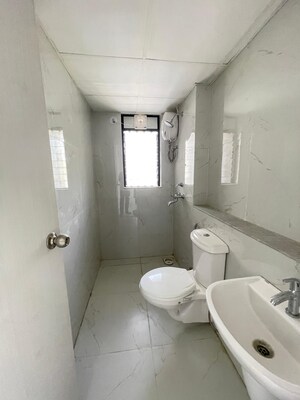 Bathroom in 2 BHK Apartment at Runwal Gardens Phase I, Dombivli East – for Sale