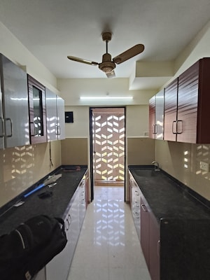 Kitchen in 2 BHK Apartment at Lodha Lakeshore Greens, Dombivli East – for Rent