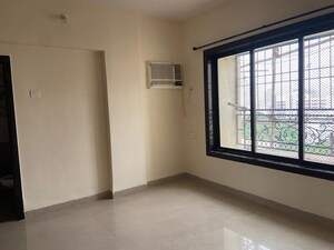 Room in 2 BHK Apartment at Atul Blue Orbit, Malad West – for Sale