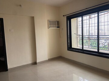 Room in 2 BHK Apartment at Atul Blue Orbit, Malad West – for Sale