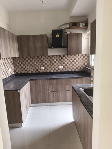 Kitchen in 2 BHK Apartment at Shapoorji Pallonji Joyville Phase 2, Sector 102 – for Rent