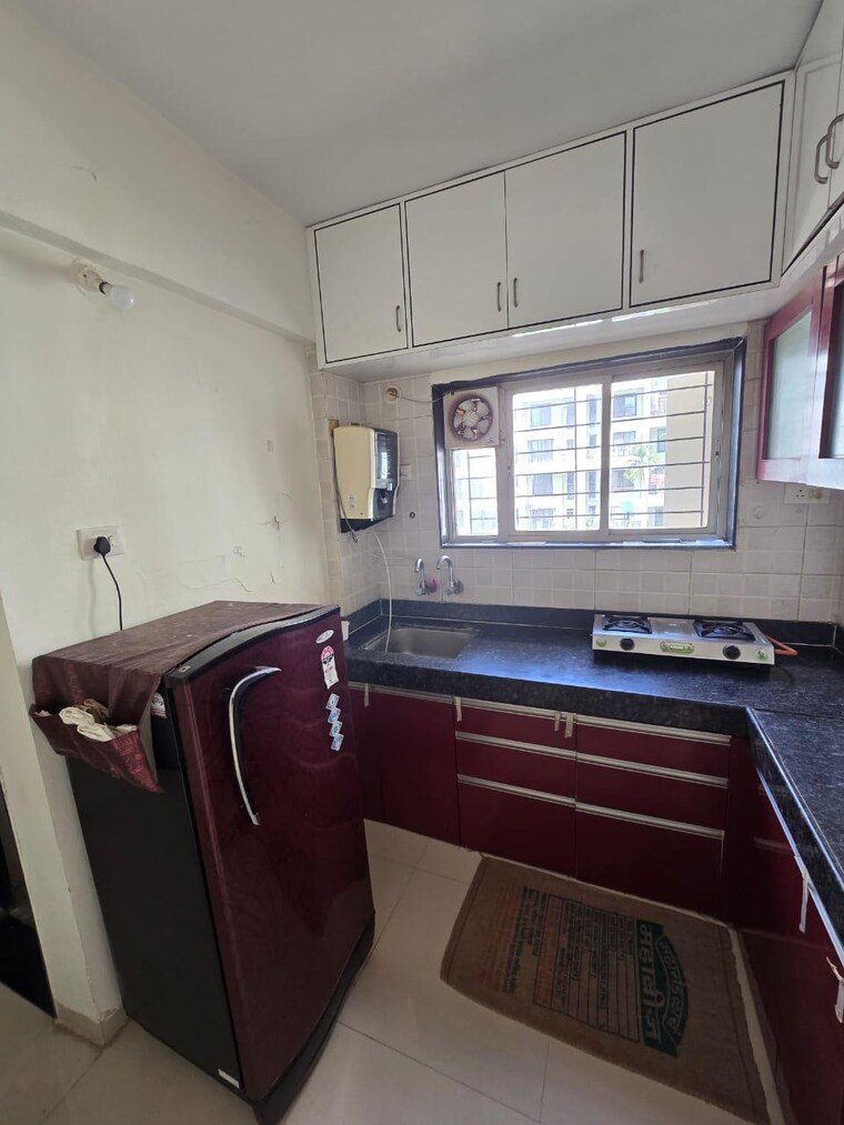 Kitchen, solitaire-paradise 1 Bedroom 750 Sq.Ft. Apartment In Wakad Pune 9653679