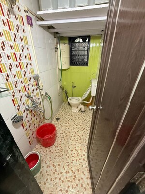 Bathroom in 2 BHK Apartment at Naupada – for Rent