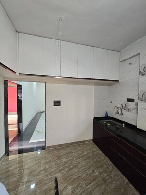Kitchen in 2 BHK Apartment at Wadgaon Sheri – for Rent