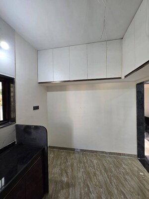 Kitchen in 2 BHK Apartment at Wadgaon Sheri – for Rent