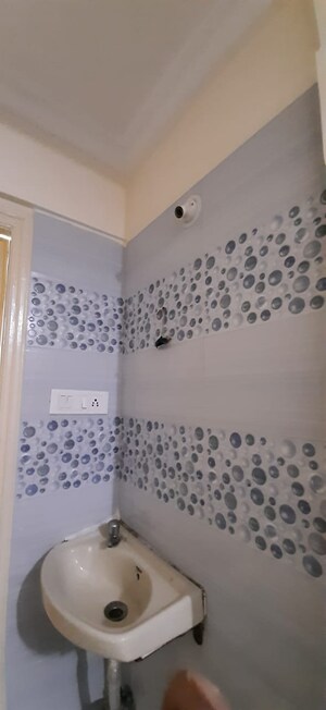 Bathroom in 2 BHK Apartment at Akash Pooja Garden, Wadegaon – for Rent