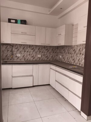 Kitchen in 2 BHK Apartment at Shri Radha Sky Gardens, Sector 16b Greater Noida – for Sale