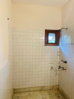 Bathroom in 3 BHK Apartment at Arun Vihar Sector 37, Sector 37 – for Rent