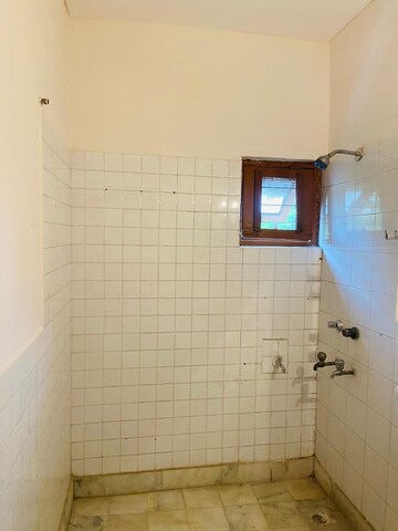 Bathroom in 3 BHK Apartment at Arun Vihar Sector 37, Sector 37 – for Rent