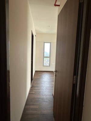 Building Lobby in 2 BHK Apartment at Piramal Vaikunth, Balkum Pada – for Rent