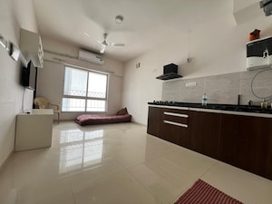 Kitchen in 1 RK Apartment at Gera World of Joy, Kharadi – for Rent