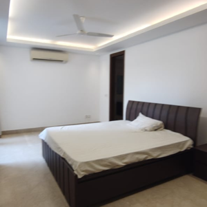 Bedroom in 4 BHK Builder Floor at Boutique Residential Apartments A-7 1, Vasant Vihar – for Rent