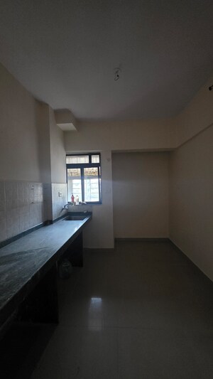 Kitchen in 1 BHK Apartment at Prakruti Heights Haware City, Haware City – for Sale