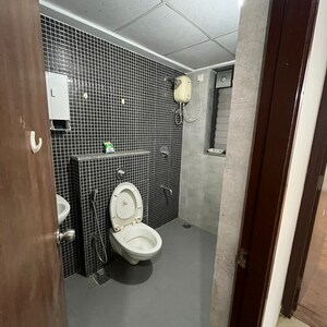 Bathroom in 1.5 BHK Apartment at Lodha Palava City Lakeshore Greens, Hedutane – for Rent