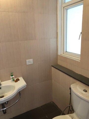 Bathroom in 3 BHK Apartment at Ramprastha City The Edge Towers, Sector 37d – for Sale