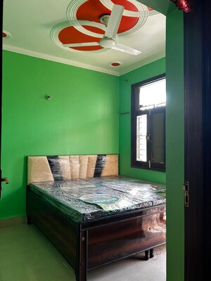 Bedroom in 1.5 BHK Builder Floor at RWA Apartments Sector 12, Sector 12 – for Rent