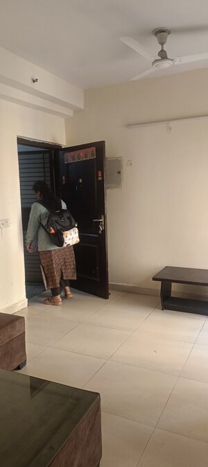 Living Room in 2 BHK Apartment at Aims Golf City, Sector 75 – for Rent