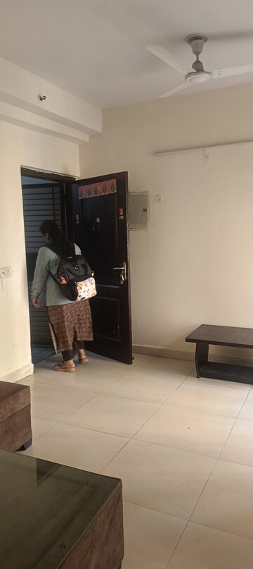 Living Room in 2 BHK Apartment at Aims Golf City, Sector 75 – for Rent