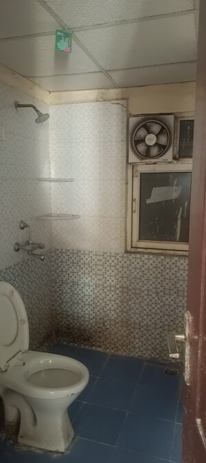 Bathroom in 2 BHK Apartment at Aims Golf City, Sector 75 – for Rent