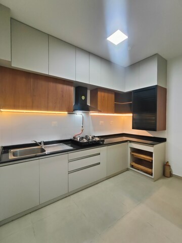 Kitchen in 2 BHK Apartment at Bhartiya Nikoo Homes Phase 2, Thanisandra Main Road – for Rent