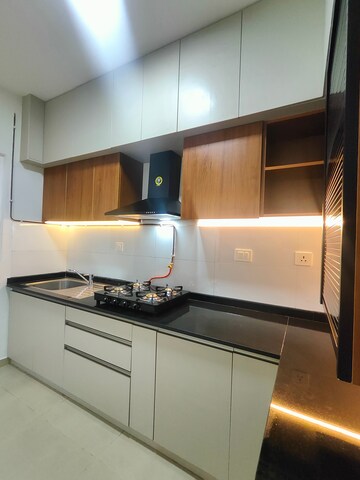 Kitchen in 2 BHK Apartment at Bhartiya Nikoo Homes Phase 2, Thanisandra Main Road – for Rent