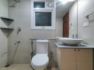 Bathroom in 2 BHK Apartment at Bhartiya Nikoo Homes Phase 2, Thanisandra Main Road – for Rent