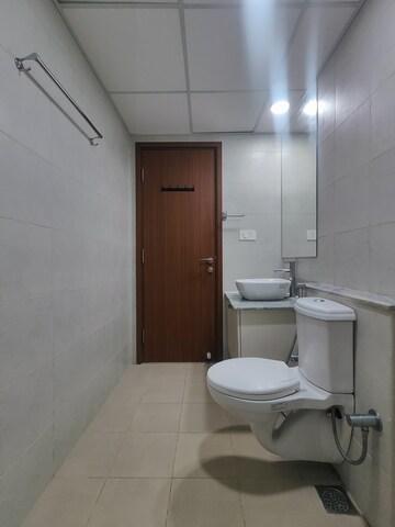 Bathroom in 2 BHK Apartment at Bhartiya Nikoo Homes Phase 2, Thanisandra Main Road – for Rent